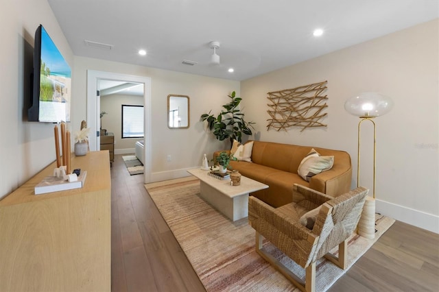 401 39th St, Holmes Beach, FL 34217 - living area with wood finished floors, recessed lighting, and baseboards