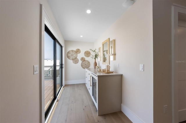 401 39th St, Holmes Beach, FL 34217 - hall with light wood-style flooring, baseboards, and recessed lighting