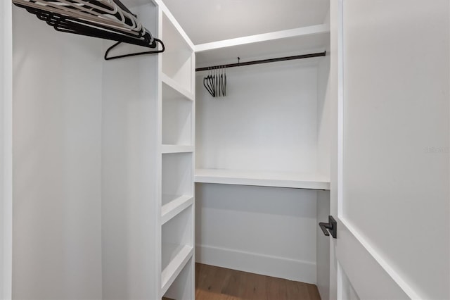 401 39th St, Holmes Beach, FL 34217 - walk in closet with wood finished floors