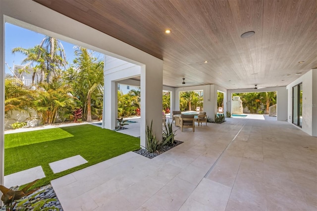 401 39th St, Holmes Beach, FL 34217 - view of patio with an outdoor pool and outdoor dining area