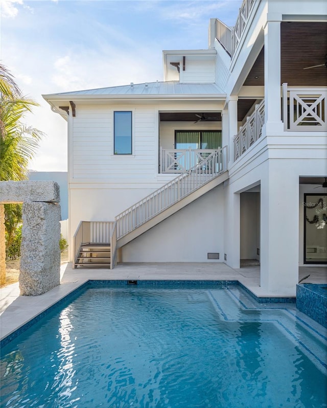 401 39th St, Holmes Beach, FL 34217 - outdoor pool featuring stairway and ceiling fan