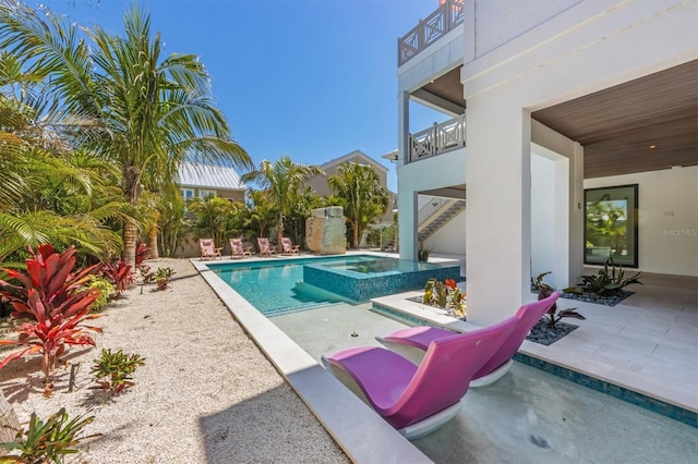 401 39th St, Holmes Beach, FL 34217 - view of pool with stairway, a patio, and a pool with connected hot tub