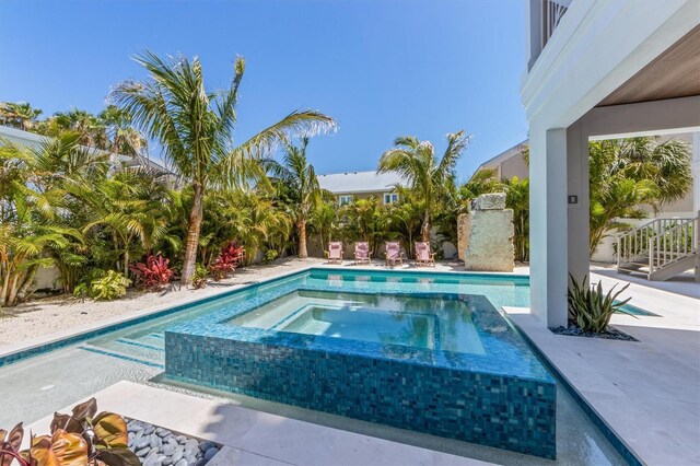 401 39th St, Holmes Beach, FL 34217 - view of pool with a pool with connected hot tub