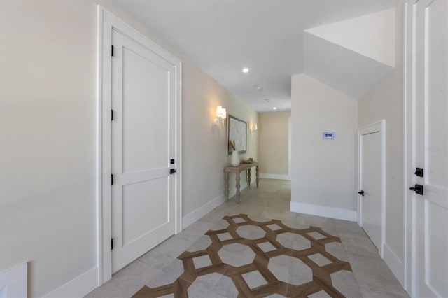 401 39th St, Holmes Beach, FL 34217 - corridor with baseboards, recessed lighting, light tile patterned floors, and inlaid floor details