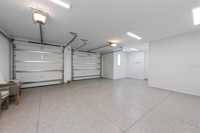 401 39th St, Holmes Beach, FL 34217 - garage featuring a garage door opener
