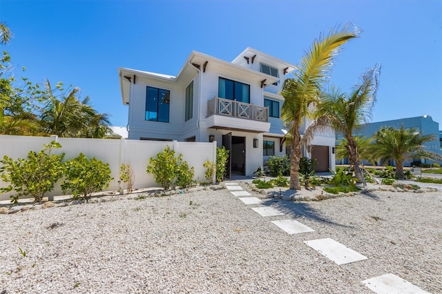 401 39th St, Holmes Beach, FL 34217 - contemporary house featuring a balcony and stucco siding