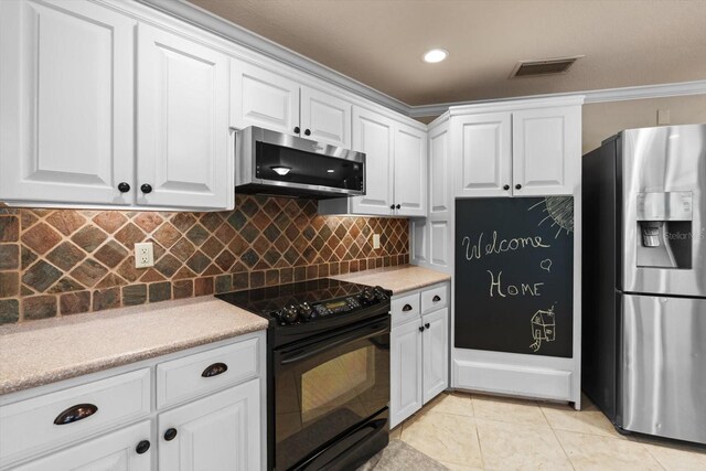 7321 Hemlock Ln, Sarasota, FL 34241 - kitchen featuring appliances with stainless steel finishes, white cabinetry, light countertops, decorative backsplash, and ornamental molding
