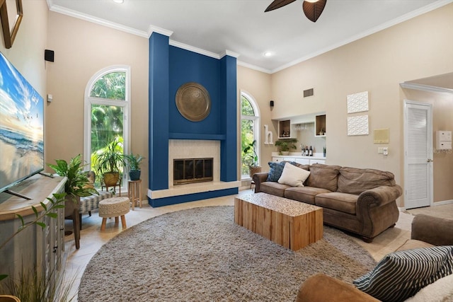 7321 Hemlock Ln, Sarasota, FL 34241 - living room featuring a towering ceiling, a ceiling fan, healthy amount of natural light, a large fireplace, and recessed lighting
