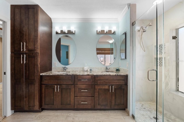 7321 Hemlock Ln, Sarasota, FL 34241 - bathroom featuring a stall shower, double vanity, and ornamental molding