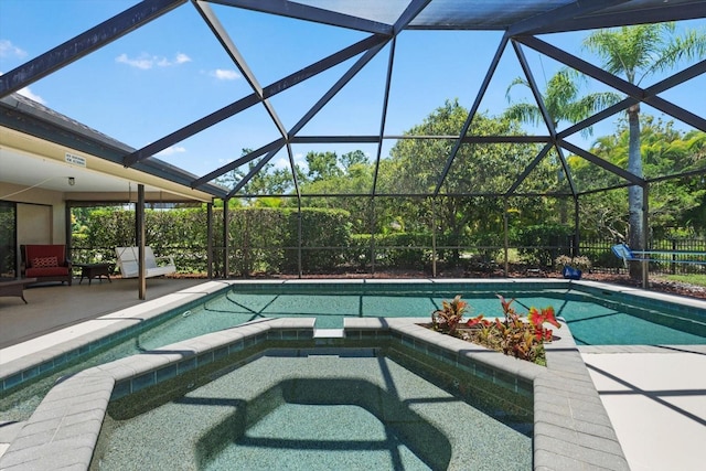 7321 Hemlock Ln, Sarasota, FL 34241 - view of swimming pool with a patio area, a pool with connected hot tub, and a lanai