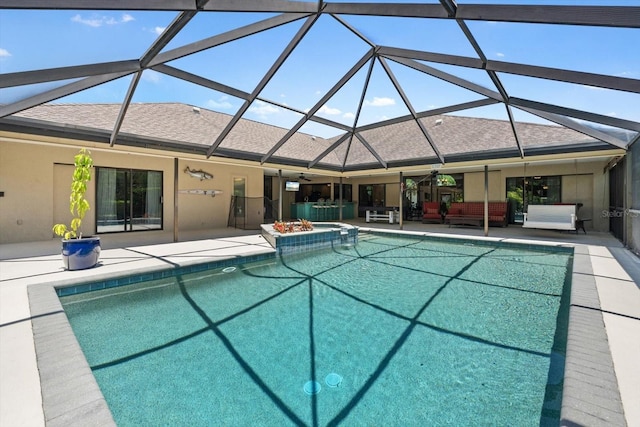 7321 Hemlock Ln, Sarasota, FL 34241 - view of swimming pool with ceiling fan, a patio area, glass enclosure, and an outdoor hangout area