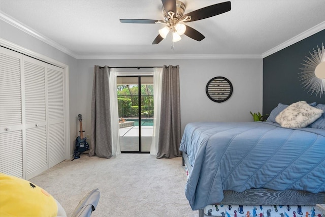 7321 Hemlock Ln, Sarasota, FL 34241 - carpeted bedroom with ornamental molding, access to exterior, a closet, and a ceiling fan