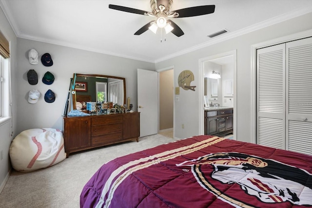 7321 Hemlock Ln, Sarasota, FL 34241 - bedroom with light colored carpet, crown molding, connected bathroom, a ceiling fan, and a sink