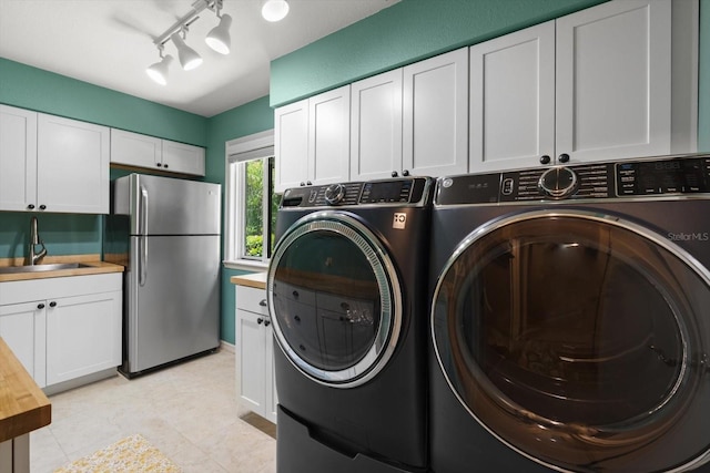 7321 Hemlock Ln, Sarasota, FL 34241 - washroom featuring washer and dryer