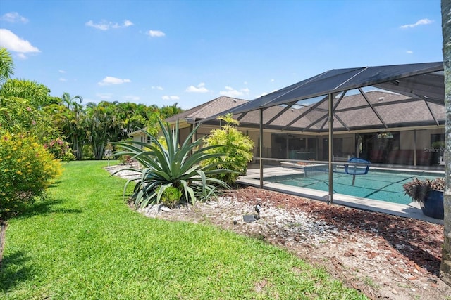 7321 Hemlock Ln, Sarasota, FL 34241 - outdoor pool with a lawn and a lanai