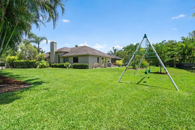 7321 Hemlock Ln, Sarasota, FL 34241 - view of yard with a playground