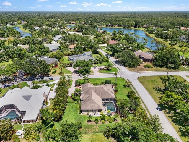 7321 Hemlock Ln, Sarasota, FL 34241 - aerial perspective of suburban area featuring a large body of water