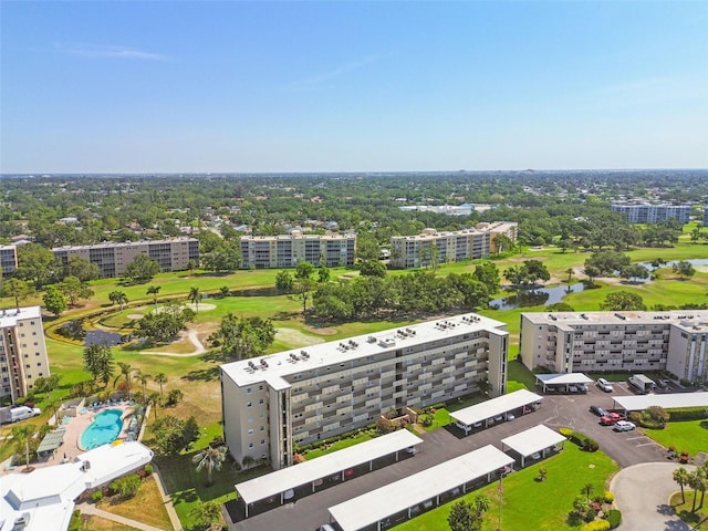 3820 Ironwood Ln Unit 104-I, Bradenton, FL 34209 - drone / aerial view of apartment complex, a large body of water, and a golf club