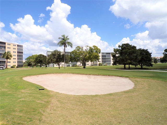 3820 Ironwood Ln Unit 104-I, Bradenton, FL 34209 - view of property's community with golf course view and a yard
