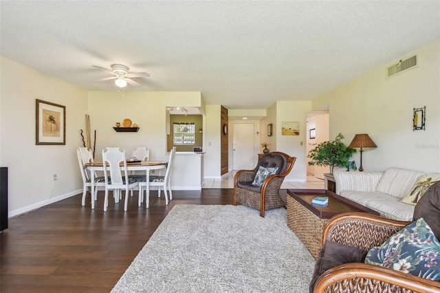 3820 Ironwood Ln Unit 104-I, Bradenton, FL 34209 - living area featuring ceiling fan, wood finished floors, a textured ceiling, and baseboards