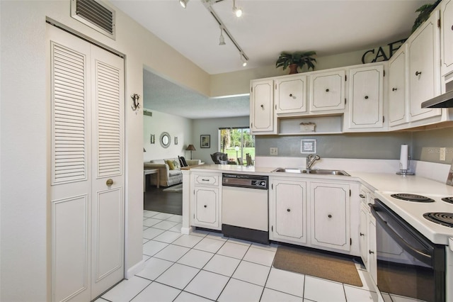 3820 Ironwood Ln Unit 104-I, Bradenton, FL 34209 - kitchen with dishwasher, electric range, a sink, and white cabinets