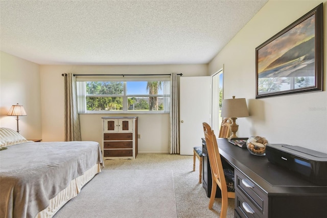 3820 Ironwood Ln Unit 104-I, Bradenton, FL 34209 - bedroom with carpet flooring and a textured ceiling