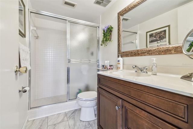 3820 Ironwood Ln Unit 104-I, Bradenton, FL 34209 - bathroom featuring vanity, toilet, a stall shower, and marble finish flooring