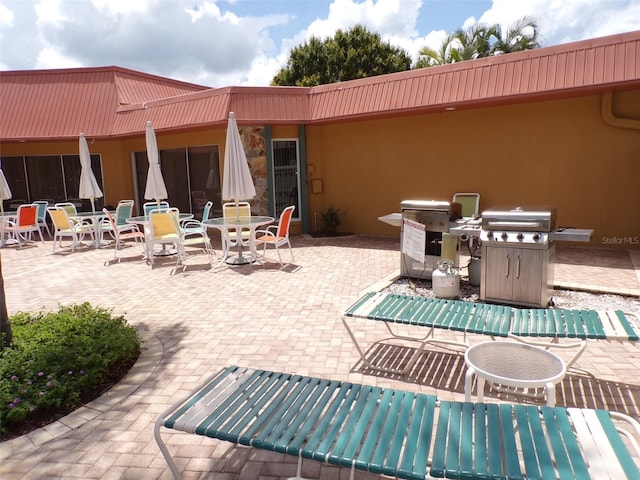 3820 Ironwood Ln Unit 104-I, Bradenton, FL 34209 - view of patio / terrace with outdoor dining area
