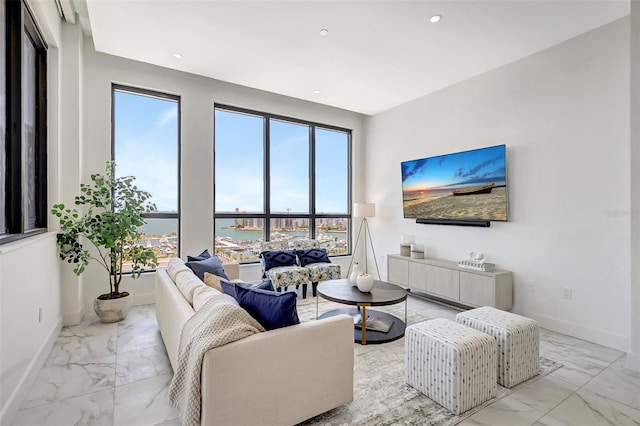33 S Palm Ave Unit 1101, Sarasota, FL 34236 - living area featuring light marble finish floors, healthy amount of natural light, baseboards, and recessed lighting