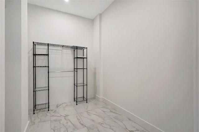 33 S Palm Ave Unit 1101, Sarasota, FL 34236 - unfurnished bedroom featuring marble finish flooring and baseboards