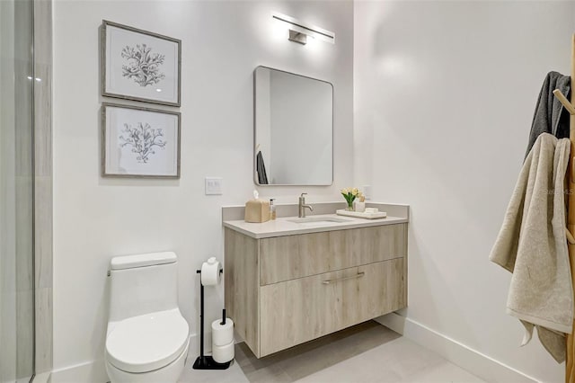 33 S Palm Ave Unit 1101, Sarasota, FL 34236 - full bathroom with baseboards, vanity, toilet, and a shower with shower door