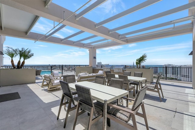 33 S Palm Ave Unit 1101, Sarasota, FL 34236 - view of patio / terrace featuring a pergola, a water view, outdoor dining area, and area for grilling