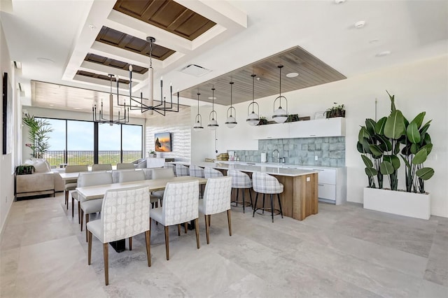 33 S Palm Ave Unit 1101, Sarasota, FL 34236 - dining room with a chandelier and beam ceiling