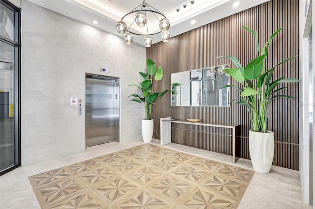 33 S Palm Ave Unit 1101, Sarasota, FL 34236 - reception featuring a chandelier, recessed lighting, and a towering ceiling