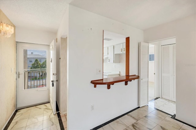 9200 Midnight Pass Rd Unit 30, Sarasota, FL 34242 - foyer entrance with light marble finish flooring and baseboards