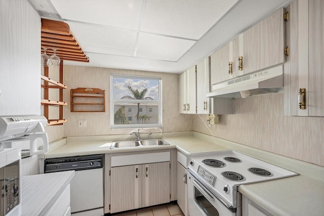 9200 Midnight Pass Rd Unit 30, Sarasota, FL 34242 - kitchen featuring white appliances, under cabinet range hood, a sink, light countertops, and open shelves