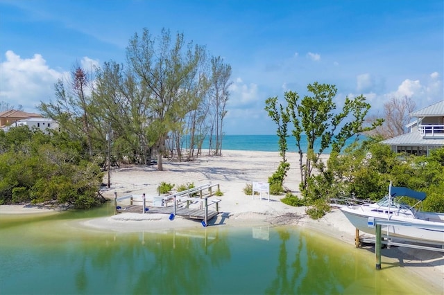 9200 Midnight Pass Rd Unit 30, Sarasota, FL 34242 - water view with a dock and local beach