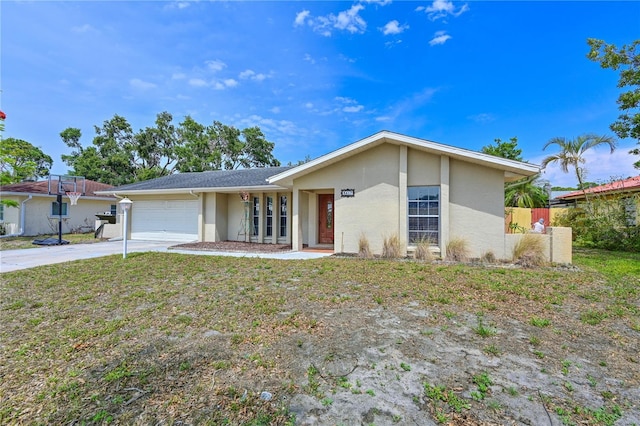 3417 49th St W, Bradenton, FL 34209 - single story home featuring stucco siding, driveway, and a garage