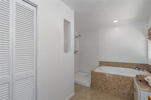 7251 Fish Farm Rd, Palmetto, FL 34221 - bathroom with tiled shower, a bath, a closet, and tile patterned floors