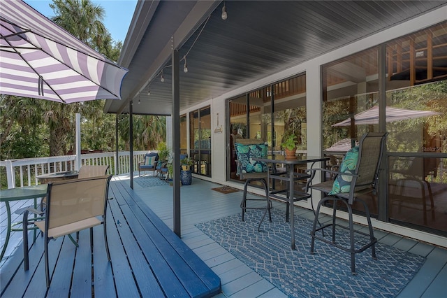 7251 Fish Farm Rd, Palmetto, FL 34221 - wooden deck with outdoor dining area