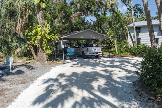 7251 Fish Farm Rd, Palmetto, FL 34221 - view of parking with a carport and driveway