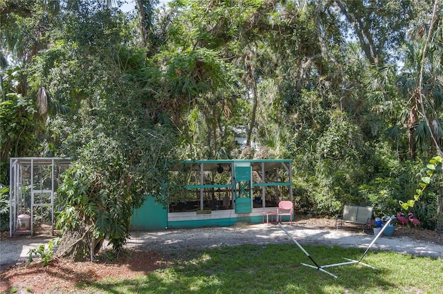 7251 Fish Farm Rd, Palmetto, FL 34221 - view of grassy yard with a playground