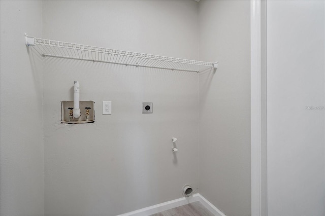 400 E Baffin Dr, Venice, FL 34293 - washroom with hookup for an electric dryer, hookup for a washing machine, and light wood-style floors