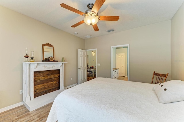 11254 82nd St E, Parrish, FL 34219 - bedroom featuring light wood-type flooring, baseboards, and ceiling fan