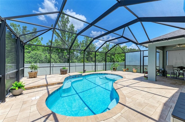 11254 82nd St E, Parrish, FL 34219 - view of pool featuring a patio, ceiling fan, a lanai, and a fenced backyard