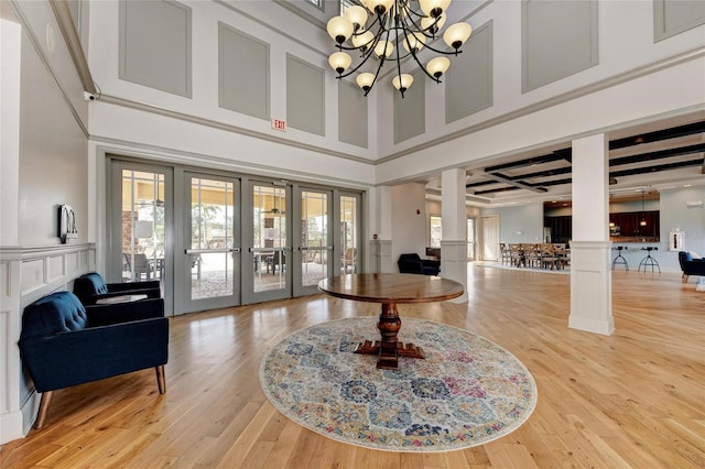 11254 82nd St E, Parrish, FL 34219 - lobby with a decorative wall, a high ceiling, and wainscoting