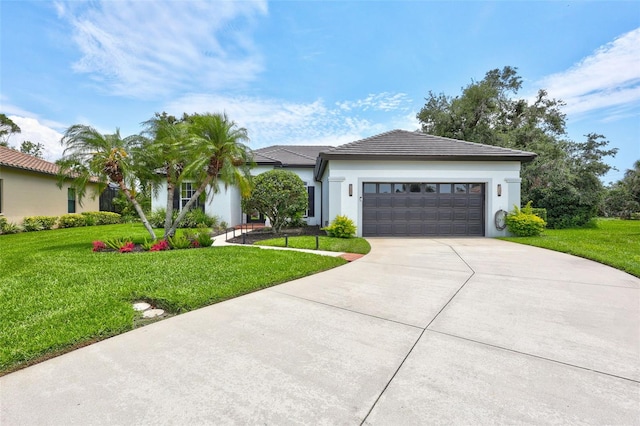 5285 Far Oak Cir, Sarasota, FL 34238 - ranch-style house with driveway, a garage, a front lawn, and stucco siding