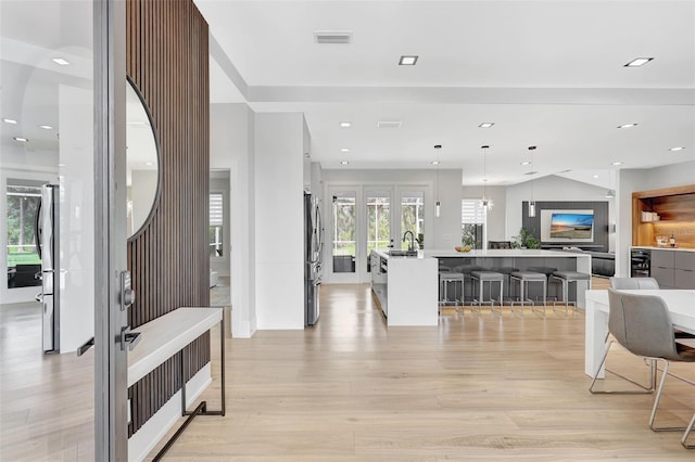 5285 Far Oak Cir, Sarasota, FL 34238 - entryway with light wood-style flooring and recessed lighting