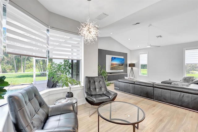 5285 Far Oak Cir, Sarasota, FL 34238 - living area with light wood-style flooring, vaulted ceiling, a chandelier, recessed lighting, and baseboards