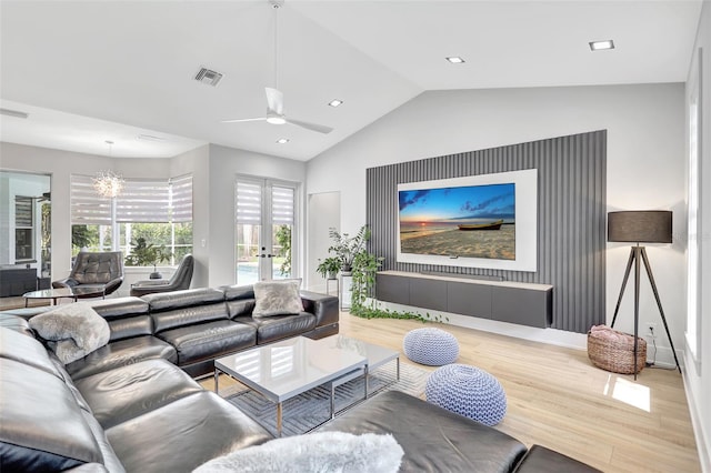 5285 Far Oak Cir, Sarasota, FL 34238 - living area featuring lofted ceiling, light wood-style floors, french doors, ceiling fan, and baseboards
